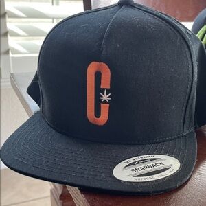 Black Snapback Cap with Orange Logo